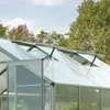Close-up view of the roof of a greenhouse with open vents, showing the aluminum frame and clear polycarbonate panels. Produktbild-Vorschau