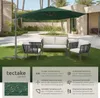 An outdoor patio set with a large cantilever umbrella, a sofa, and two chairs on a green lawn in front of a building. Náhled obrázku produktu