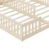 Close-up view of a wooden bed frame with a slatted base and guardrails. Anteprima dell’immagine prodotto