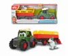 A toy tractor with a trailer and a cow, shown both in its packaging and as a standalone product. Produktbild-Vorschau