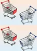 Four mini shopping carts, two with red handles and two with blue handles, arranged in a two-by-two grid against a gradient background. Produktbild-Vorschau