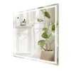 A bathroom scene reflected in a mirror, featuring a cabinet, a plant, and decorative wall molding. Anteprima dell’immagine prodotto