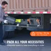 A man is loading a toolbox into a truck bed storage compartment. Náhled obrázku produktu