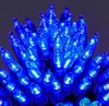 A close-up view of a cluster of blue LED string lights. Produktbild-Vorschau