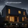 A modern house at night with outdoor lighting, under a stormy sky. Produktbild-Vorschau