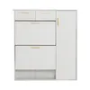 A white shoe cabinet with gold handles against a white background. Produktbild-Vorschau