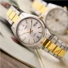 A close-up shot of a two-tone Casio watch with a silver and gold band and a white face. Produktbild-Vorschau