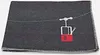 A folded blanket with a graphic of a ski lift gondola. Produktbild-Vorschau