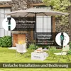 A patio umbrella set up in a backyard with chairs and a storage box. Produktbild-Vorschau