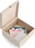 An open wooden box with some cards and other small items inside. Produktbild-Vorschau