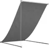 A gray awning is extended and supported by poles. Produktbild-Vorschau