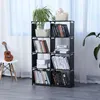 A bookshelf filled with books and decorative items, placed next to a chair with a ukulele. Produktbild-Vorschau