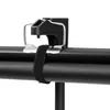 A close-up shot of a black projection screen clamp and strap attached to a black roller tube. Produktbild-Vorschau