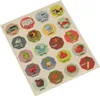 A sheet of stickers featuring various animals, vehicles, and fruits, each on an octagonal background with its name printed below. Anteprima dell’immagine prodotto