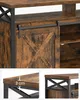 Close-up view of a rustic-style TV stand with a sliding barn door, along with detail shots showing the thickness of the top and a decorative metal crossbar. Produktbild-Vorschau
