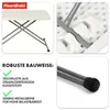A collage of four images showcasing a folding table, highlighting its construction and features. Voir les images du produit