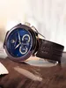 A close-up shot of a Maserati chronograph watch with a blue dial and brown leather strap, resting on a reflective surface. Produktbild-Vorschau
