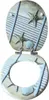 A toilet seat and lid with a beach-themed design. Produktbild-Vorschau