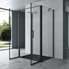 A modern bathroom with a black framed glass shower enclosure. Produktbild-Vorschau
