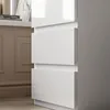 A close-up of white drawers on a piece of furniture. Produktbild-Vorschau