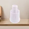 A white plastic vegetable and fruit slicer sits on a wooden countertop against a light gray wall. Voir les images du produit