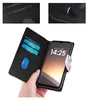 A hand holding a black flip-style phone case open, revealing the phone inside and card slots. Produktbild-Vorschau