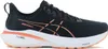 A side view of a single black running shoe with orange accents. Produktbild-Vorschau