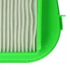 Close-up view of a green and white air filter. Produktbild-Vorschau