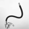 A modern kitchen faucet with a flexible black hose and a chrome handle, set against a plain white background. Produktbild-Vorschau