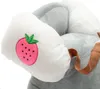 Close-up of a plush toy with a strawberry design. Náhled obrázku produktu
