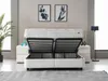 A bed with its storage compartment open, in a bedroom setting. Produktbild-Vorschau