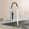 A modern kitchen faucet with a digital display, dispensing water into a sink. Náhled obrázku produktu