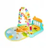 A colorful baby play mat with an arch and hanging toys, and an attached interactive piano. Produktbild-Vorschau