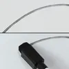A close-up view of a whiteboard marker and a metal strip, likely part of a whiteboard or magnetic surface. Produktbild-Vorschau