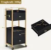 A black rolling cart with gold accents, shown with dimensions and a separate drawer. Produktbild-Vorschau