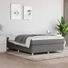 A bedroom scene with a bed and artwork on the wall. Náhled obrázku produktu