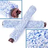 Two vacuum cleaner brush rolls are crossed over each other on a white background. Produktbild-Vorschau