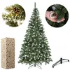 A decorated artificial Christmas tree with pinecones and snow, shown with its packaging and stand. Produktbild-Vorschau