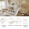 A white bunk bed with a slide and storage drawers, set up in a child's bedroom with a rug and small table and chairs. Náhled obrázku produktu