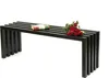 A black metal bench with a book and red roses on it, set against a white background. Produktbild-Vorschau