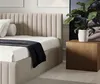 A bedroom scene with a bed, nightstand, and plant. Náhľad obrázku produktu