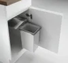 A white kitchen cabinet with a pull-out trash bin system installed. Anteprima dell’immagine prodotto
