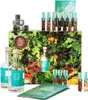 A whiskey making kit with bottles, ingredients, and accessories arranged on a box with a nature-themed design. Produktbild-Vorschau