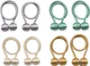 Four sets of decorative curtain tie-backs, each with a braided cord and two magnetic balls, are displayed against a white background. The sets are arranged in a 2x2 grid, with each set in a different color: silver, green, beige, and gold. Náhled obrázku produktu