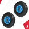 Two wheels with blue rims and black tires are shown against a blueprint-like background. Anteprima dell’immagine prodotto