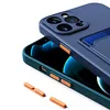A close-up shot of a dark blue phone case with an orange accent, placed on top of a smartphone. Produktbild-Vorschau