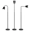 Three black floor lamps with gold accents are displayed against a white background. Náhľad obrázku produktu