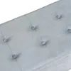 A close-up of a light gray tufted upholstered surface, likely a bench or ottoman. Produktbild-Vorschau