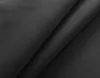 A close-up view of black fabric, folded to show its texture and depth. Produktbild-Vorschau