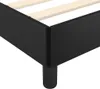 Close-up of the corner of a black bed frame with wooden slats visible. Náhled obrázku produktu